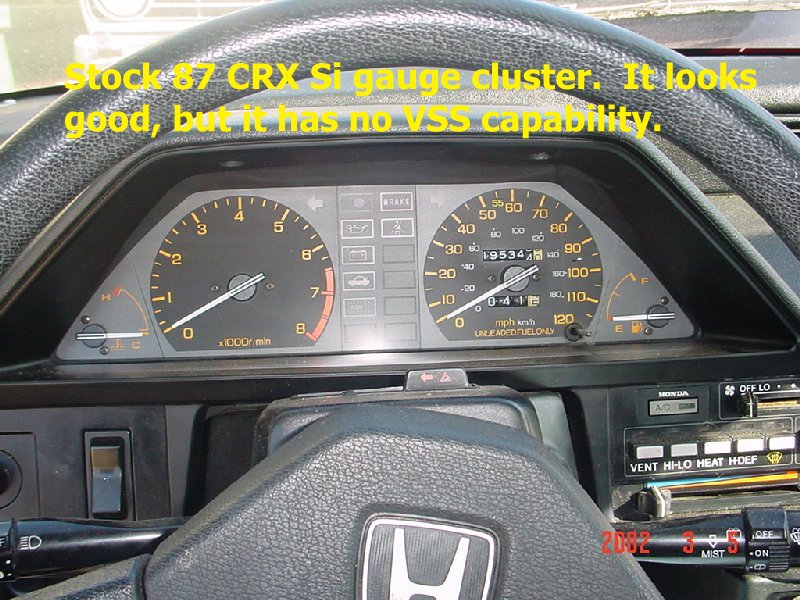 Here is my original 87 CRX Si cluster in the car